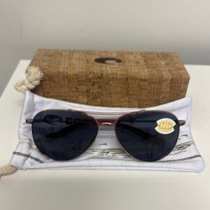 Costa Peli Aviator Sunglasses with Rose Gold/pink frame and Gray 580P lenses.